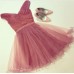 Rochie din tulle fin strawberry rose, cu decolteu amplu pe linia umerilor, si crosaj fronsat